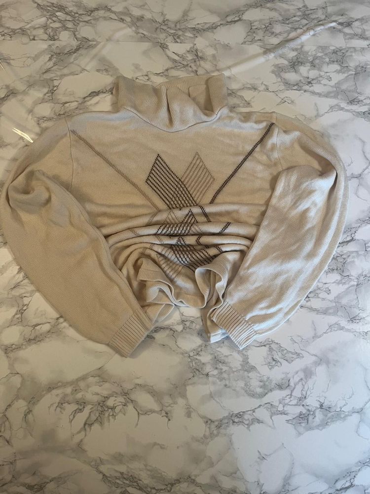 Beige Turtleneck Sweater With Geometric Pattern